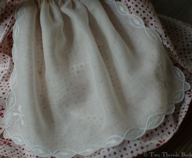 The apron, modeled by Pharaby.