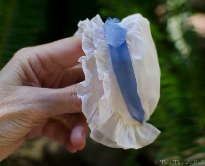 Most all of my silk ribbon was for embroidery and too narrow for Pharaby's cap. So like everyone else in the colonies, we had to wait on the latest imported goods to find just the right ribbon.