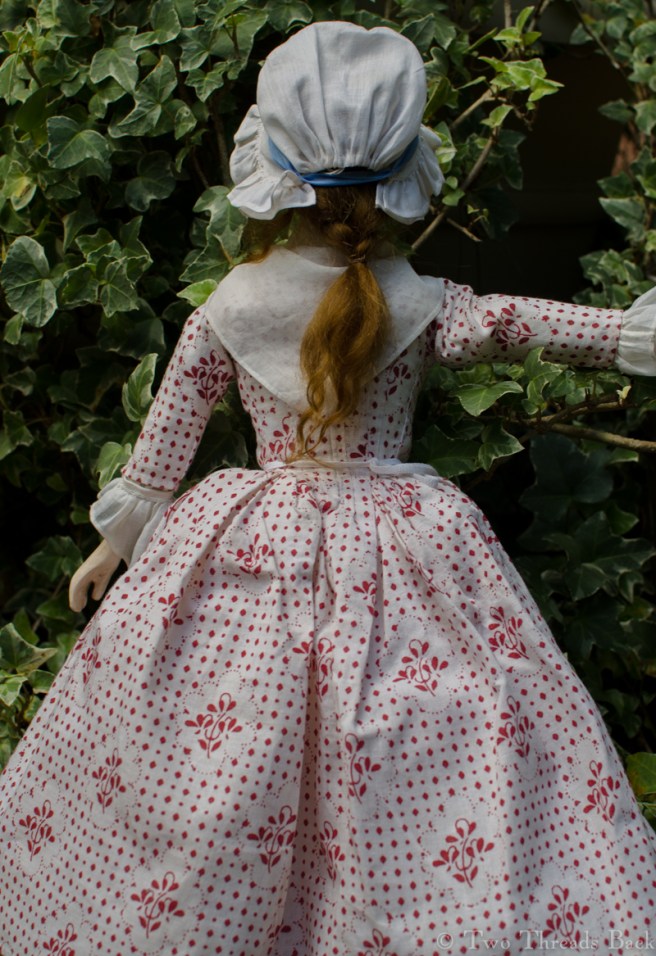 Pharaby gazes blankly at a wall of ivy, so you may see her from the back. She's wearing her bum roll under there somewhere!