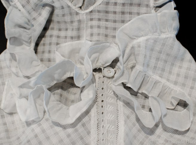 With two loops fastened. Like we're doing a strip-tease in reverse here.